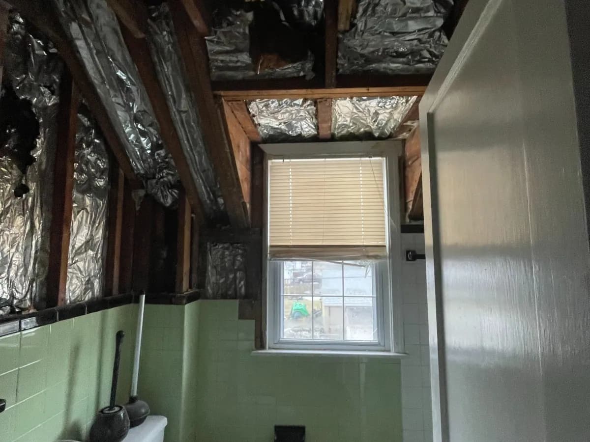 Before: storm and roof-leak damage restoration in a Philadelphia-area home